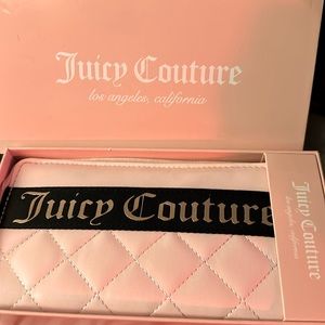 Juicy couture, pink quilted, zip up wallet/wristlet. New in box Approx 4”x8”